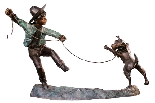 bronze boy with bronze dog