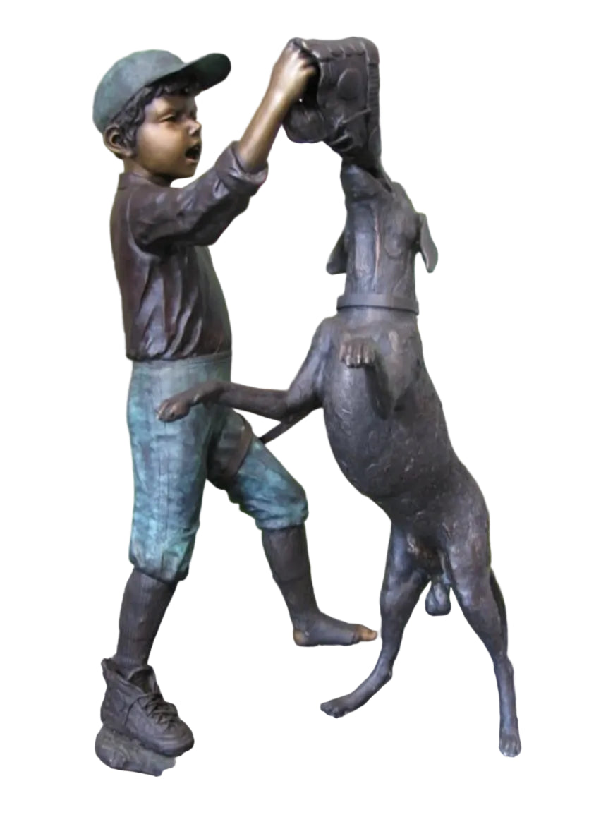 Boy playing with dog bronze