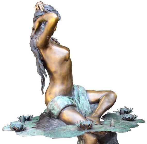 Elegant Woman on Rock