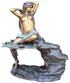 Elegant Woman on Rock