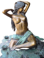Elegant Woman on Rock
